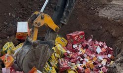 Raflarda satılmayı bekleyen ürünler toprağa gömülerek imha edildi