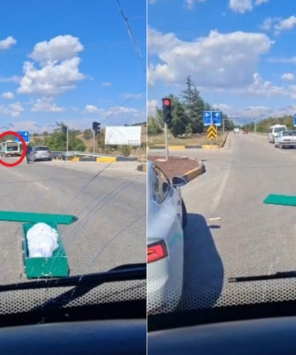 Tabut seyir halindeki cenaze nakil aracından yola düştü