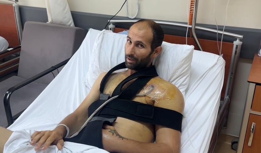 Çöpte bulduğu tabancayı kurcalarken omzundan vuruldu