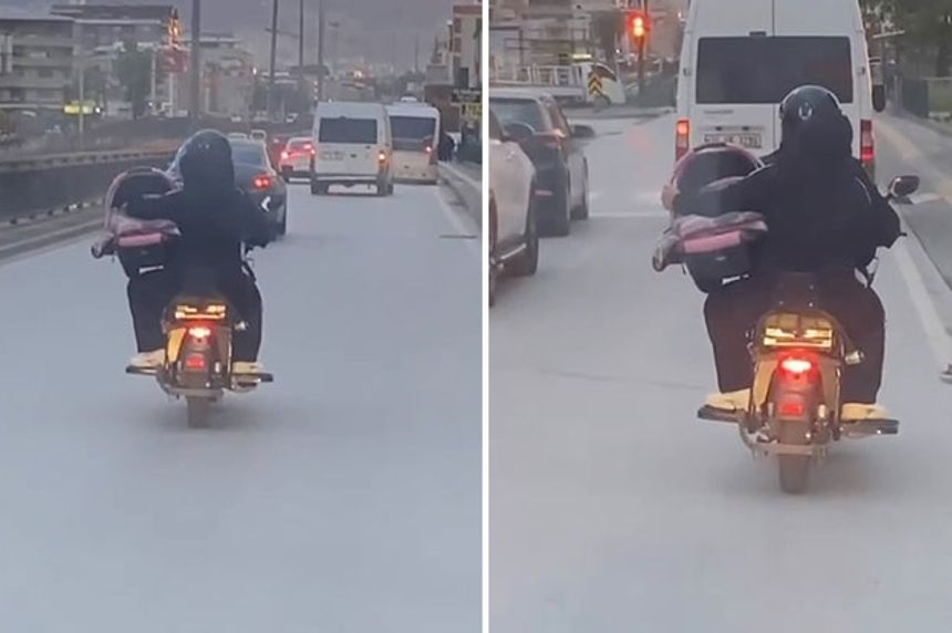 Bursa’da tehlikeli yolculuk! Bebek pusetini motosiklet üzerinde taşıdı